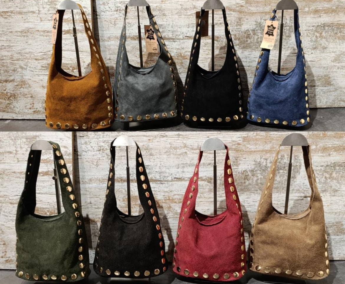 Bolso piel saquito tachuelas