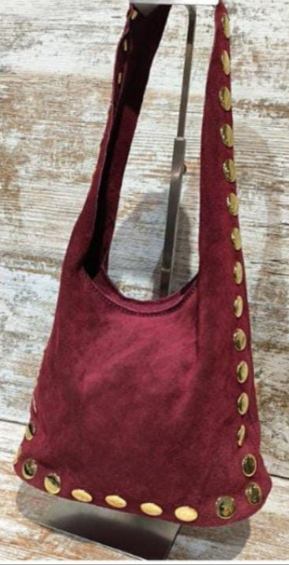 Bolso piel saquito tachuelas